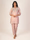 cream embellished co-ord set for women with kurta style top and straight pants elegant ethnic wear