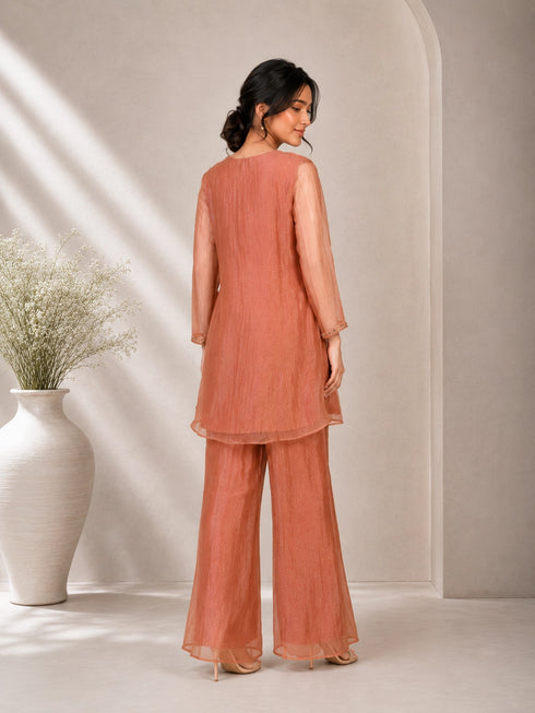 Elegant Peach Embroidered Kurta with Tassel Detail
