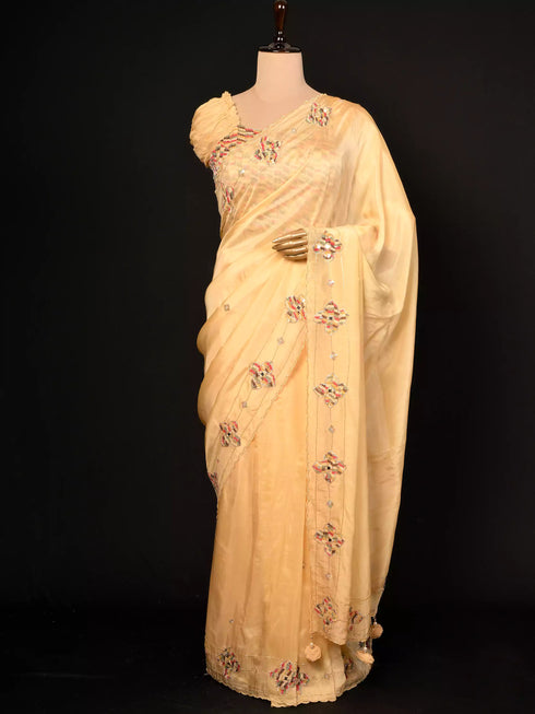Cream saree with patch work & Moti Border