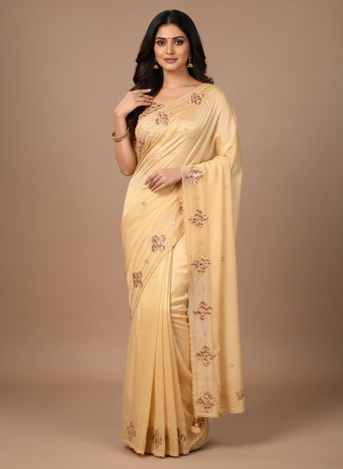 Cream saree with patch work & Moti Border