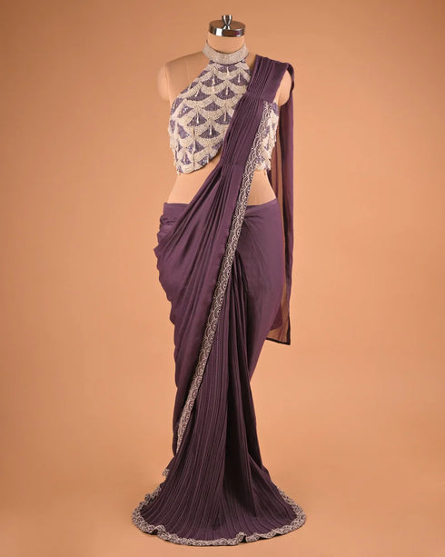 Plum Pleated Designer Saree with Halter Neck Embellished Blouse