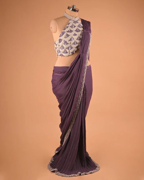 Plum Pleated Designer Saree with Halter Neck Embellished Blouse