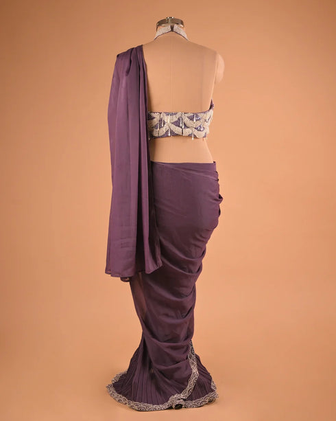 Plum Pleated Designer Saree with Halter Neck Embellished Blouse