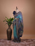 Teal Blue Bandhani Printed Saree with Navy Floral Woven Border – Festive Wear