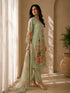 A woman models a green floral embroidered Kurti Set with matching pants and a dupatta, featuring delicate lace trim.