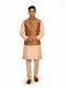Man wearing a multi-color ethnic Nehru jacket over a cream kurta and pants, suitable for festive occasions.