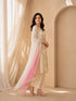 Woman wearing a cream floral print Kurti Set with a pink ombre dupatta and matching pants.