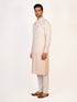 Man wearing a multi-color embroidered kurta and white pants, traditional Indian ethnic wear.