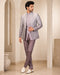 Man wearing a stylish grey Indowestern suit, perfect for formal events and celebrations.