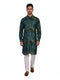 Man wearing a teal kurta with a multi-color geometric print and white pants, standing against a white background.