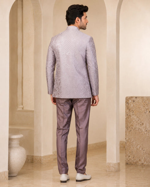 Man wearing a stylish grey Indowestern suit, perfect for formal events and celebrations.