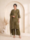 Woman wearing an olive green printed kurti with palazzo pants and a dupatta, styled for a casual or festive occasion.