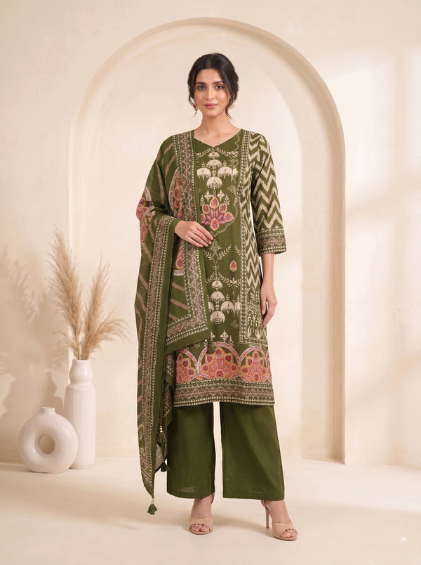 Woman wearing an olive green printed kurti set with palazzo pants and a matching dupatta.