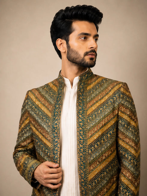 Elegant M.Green Indowestern ensemble featuring intricate details, perfect for festive celebrations.