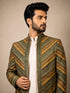 Elegant M.Green Indowestern ensemble featuring intricate details, perfect for festive celebrations.