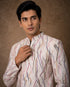 Men's royal purple Jodhpuri suit, a traditional Indian ethnic wear for formal events.