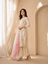 Woman wearing a cream floral print Kurti Set with a pink ombre dupatta and matching pants.