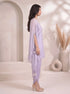 Woman wearing a light purple embroidered kaftan with split sleeves and matching dhoti pants, adorned with mirror work.