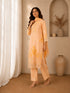 Woman wearing a yellow floral embroidered Kurti Set with lace trim and matching dupatta.
