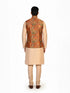 Man wearing a multi-color ethnic Nehru jacket over a cream kurta and pants, suitable for festive occasions.