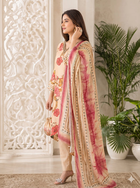 Woman wearing a brown floral print kurta set with a dupatta, embellished neckline, and matching pants.