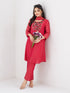 Woman wearing a Rani red Sharara with a geometric print yoke and matching dupatta, styled with pearl earrings.