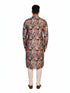 Man wearing a multi-color floral print kurta with an embellished neckline and cream churidar pants.