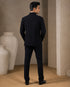 A classic navy taxido suit, perfect for formal events and special occasions.