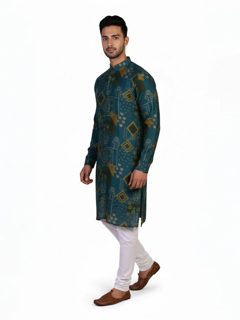 Man wearing a teal kurta with a multi-color geometric print and white pants, standing against a white background.