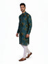 Man wearing a teal kurta with a multi-color geometric print and white pants, standing against a white background.