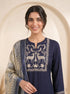 Navy blue embroidered kurti and pants set with a printed dupatta draped over the shoulder.