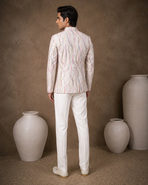 Men's royal purple Jodhpuri suit, a traditional Indian ethnic wear for formal events.