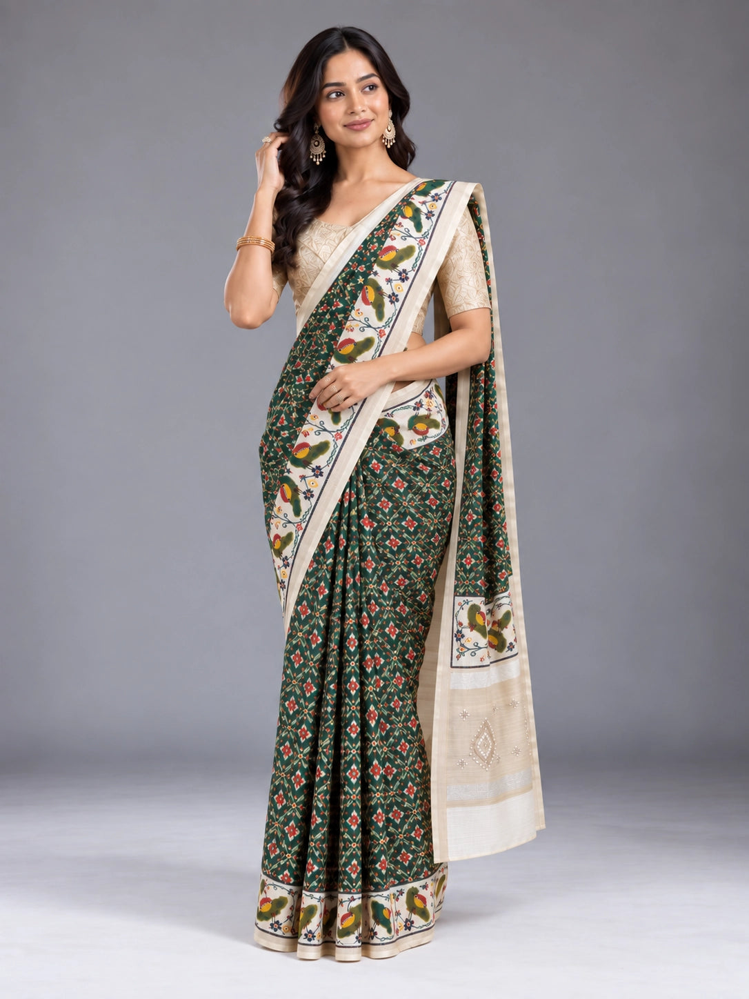 Exquisite Green Patola Saree with Gold Blouse from  Collection
