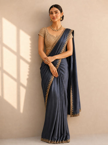 Sophisticated Grey Saree with Intricate Golden Border