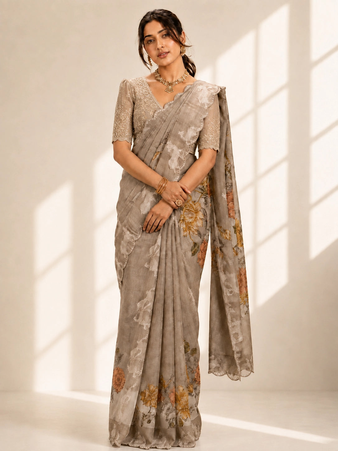 Elegant  Peach Floral Saree with Shimmering Golden Blouse