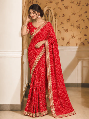 Red Printed Saree with Intricate Zari Border