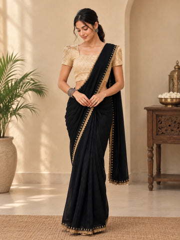 Elegant Black Saree with Gold Embroidered Border and Blouse