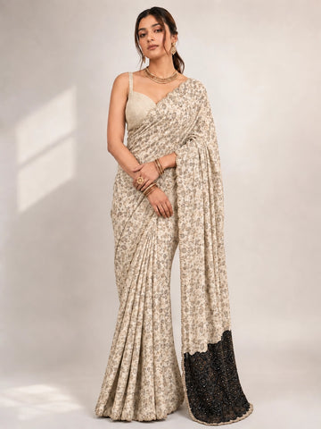 Elegant Cream  Printed Saree with Gold Blouse and Embellished Pallu