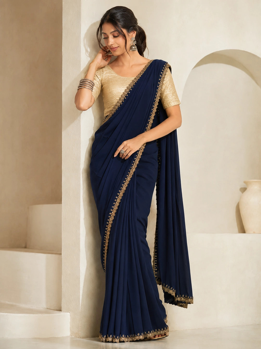 Chic Navy Blue Saree with Embellished Gold Blouse