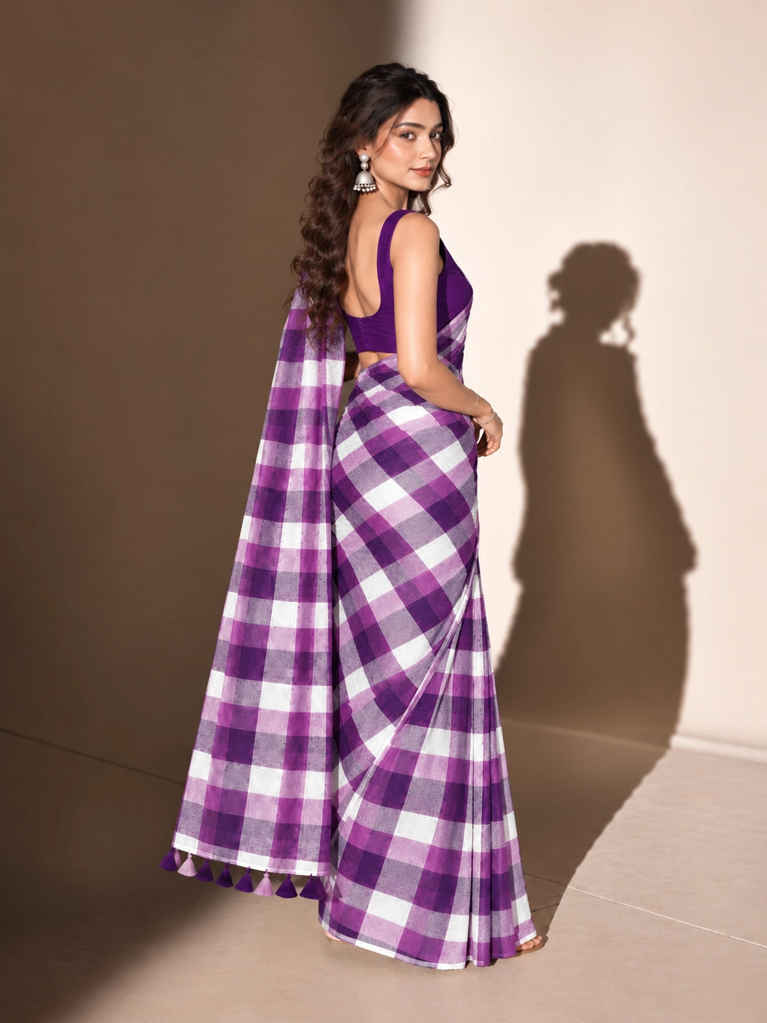 Designer Woven Saree with Checks Pattern & Elegant Tassel Border