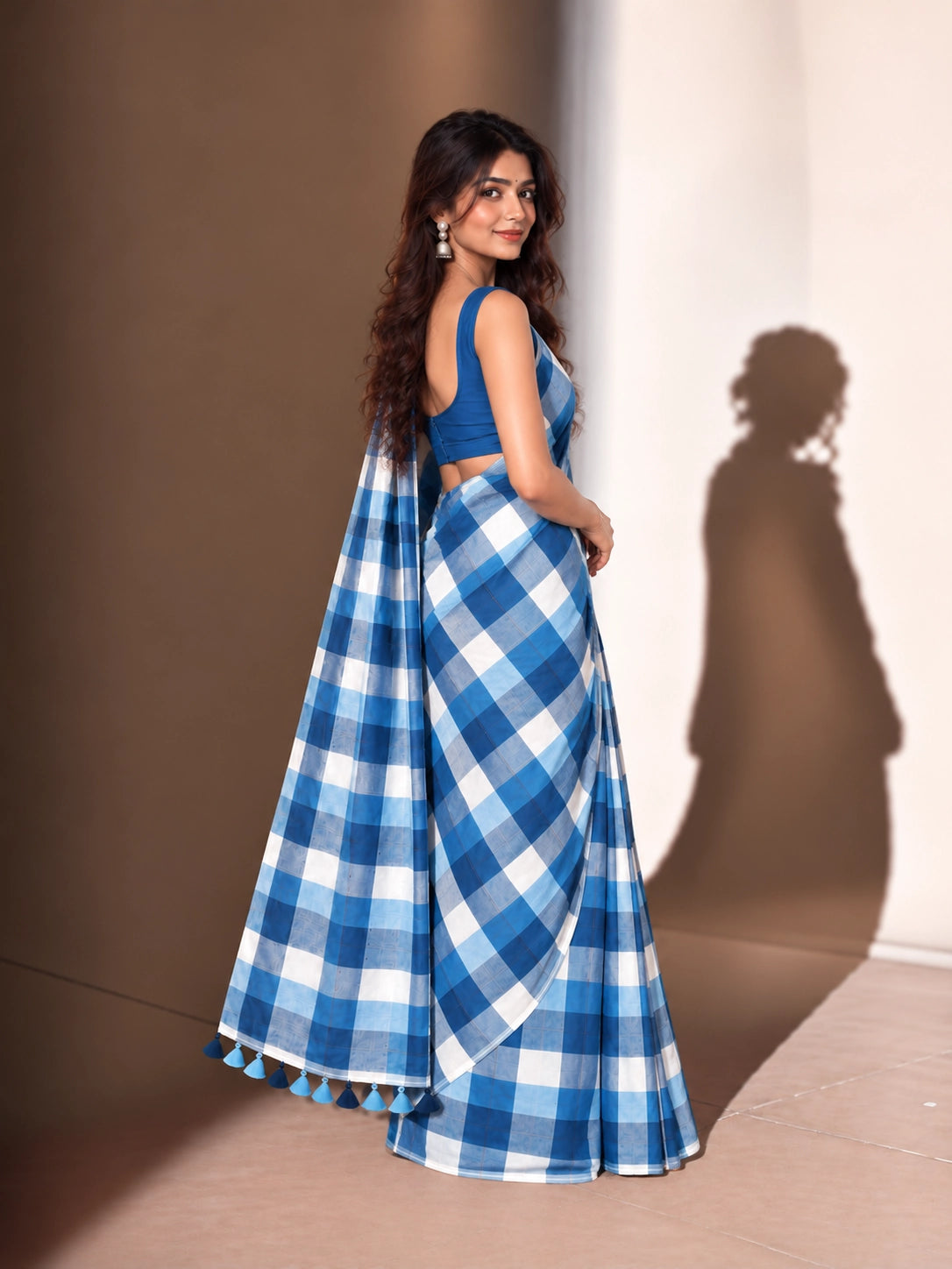 Designer Woven Saree with Checks Pattern & Elegant Tassel Border