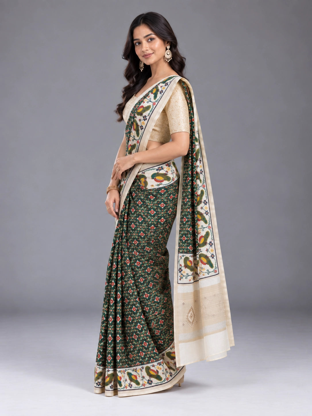 Exquisite Green Patola Saree with Gold Blouse from  Collection