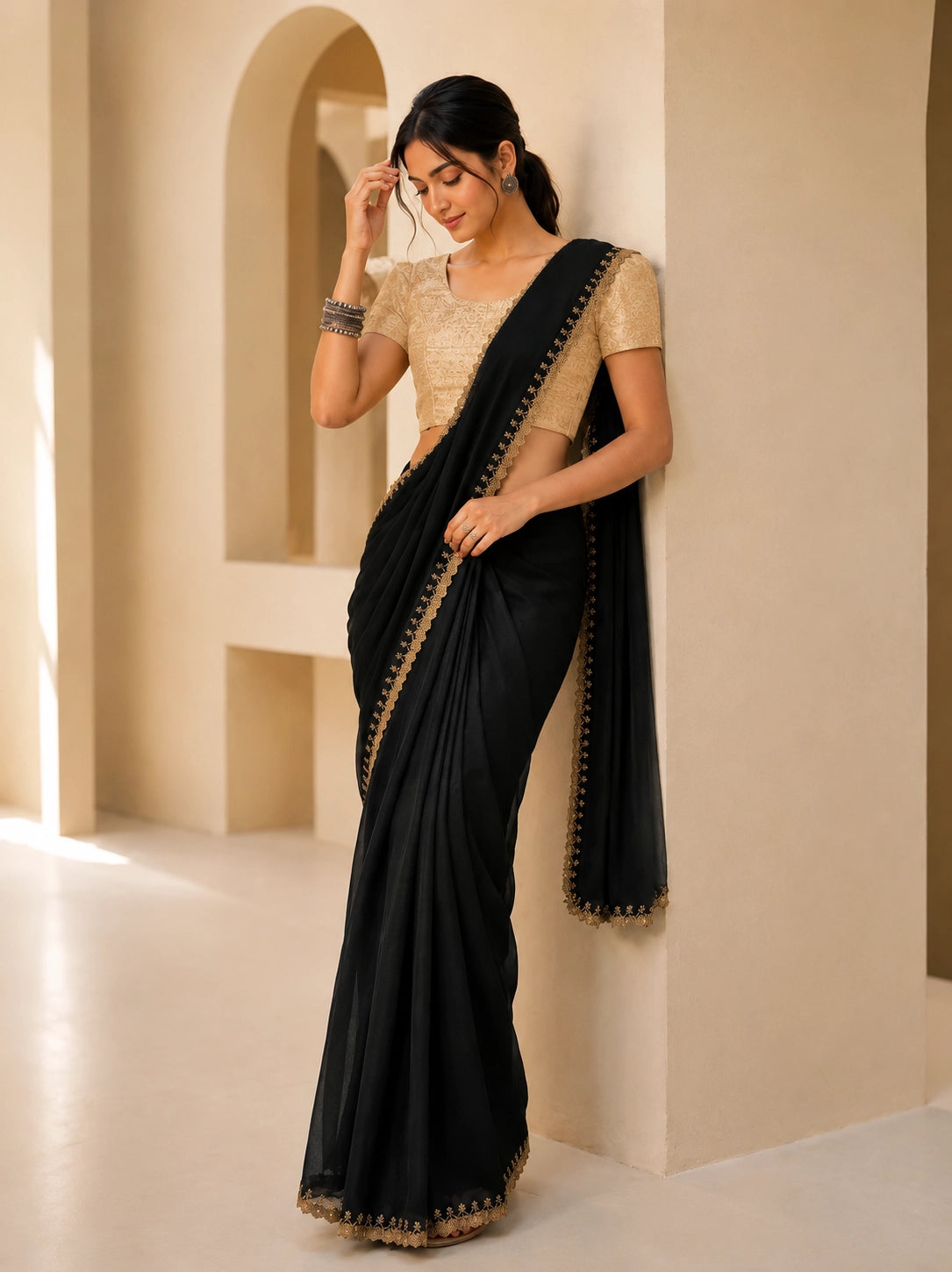 Elegant Black Saree with Gold Embroidered Border and Blouse