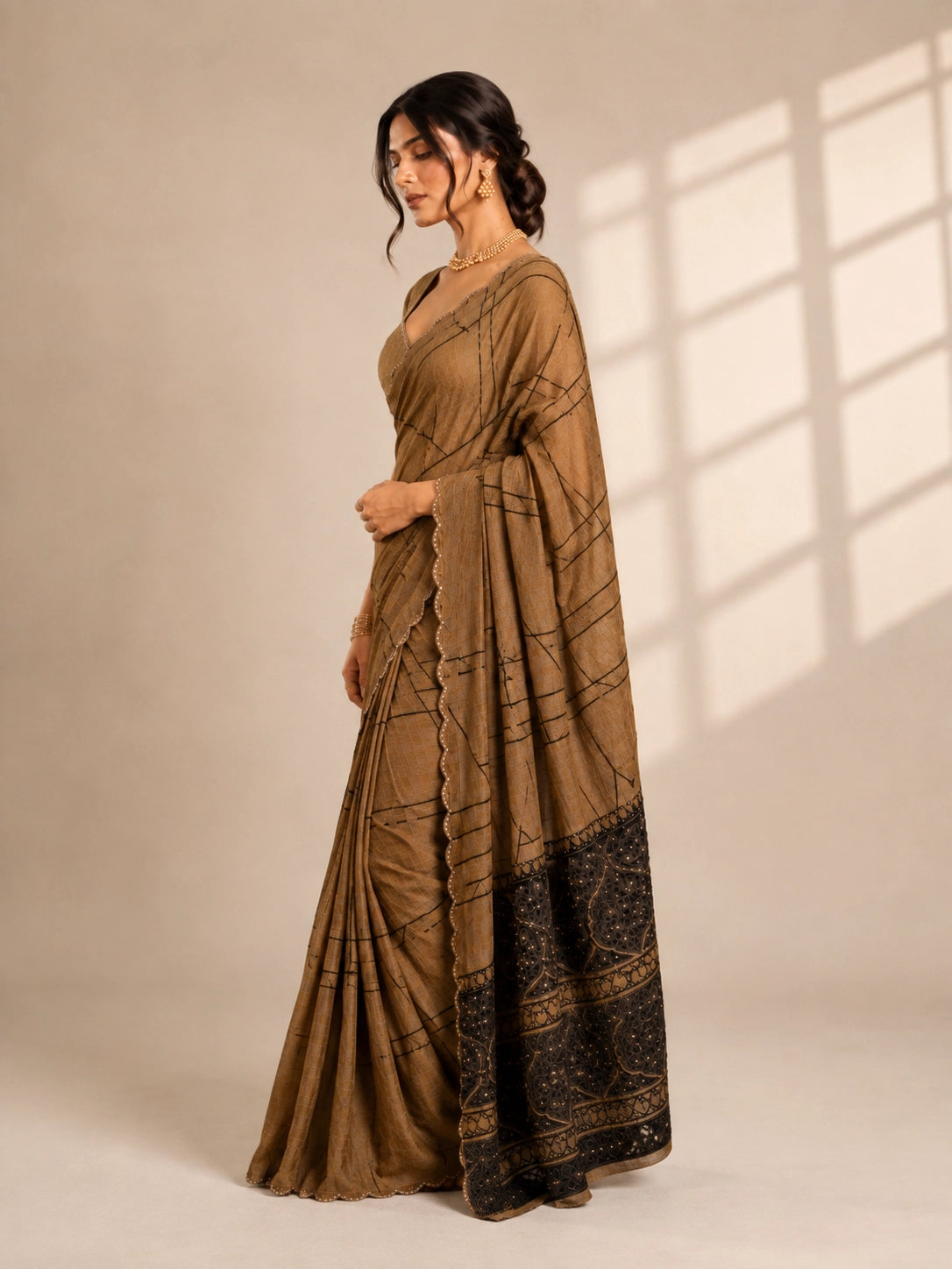 Elegant Brown  Saree with Geometric Print and Embellished Border