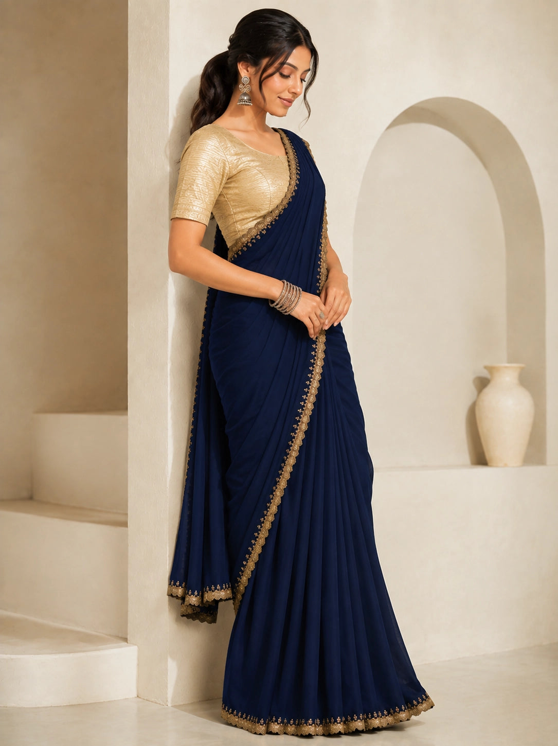 Chic Navy Blue Saree with Embellished Gold Blouse