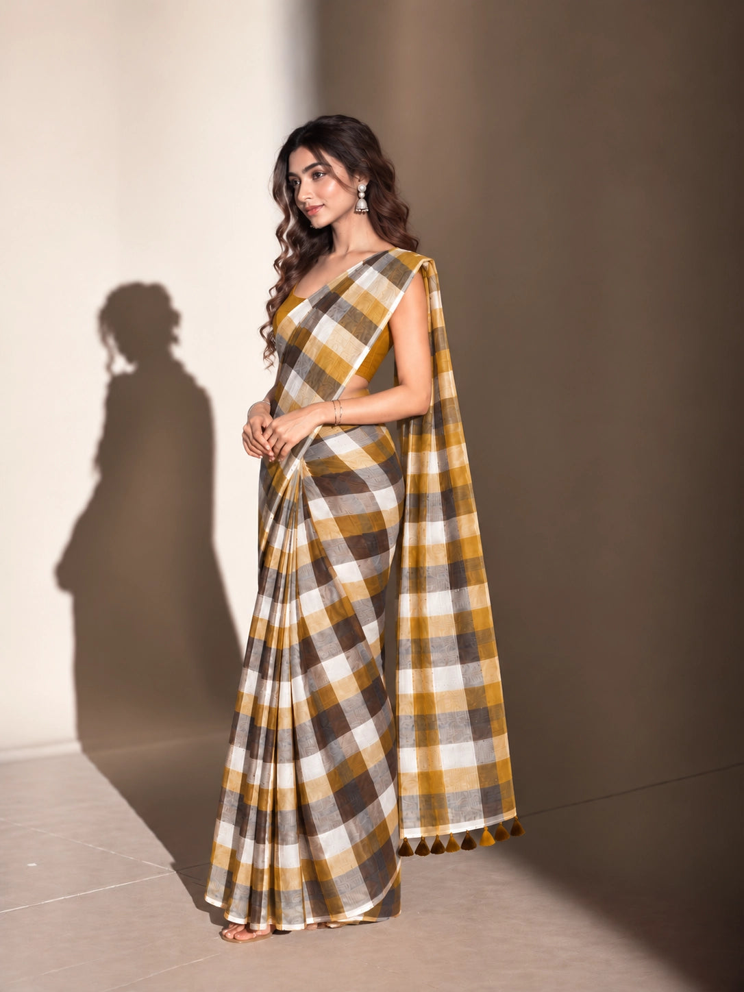 Designer Woven Saree with Checks Pattern & Elegant Tassel Border