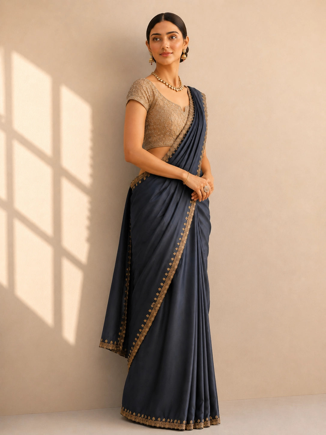 Sophisticated Grey Saree with Intricate Golden Border