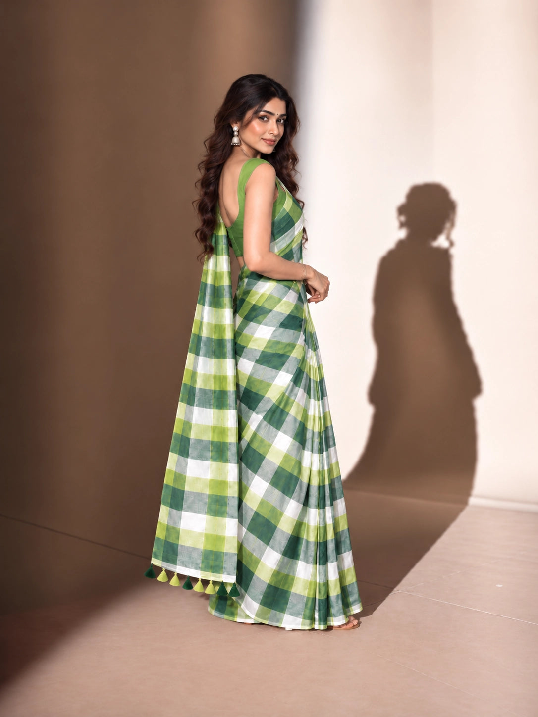 Designer Woven Saree with Checks Pattern & Elegant Tassel Border