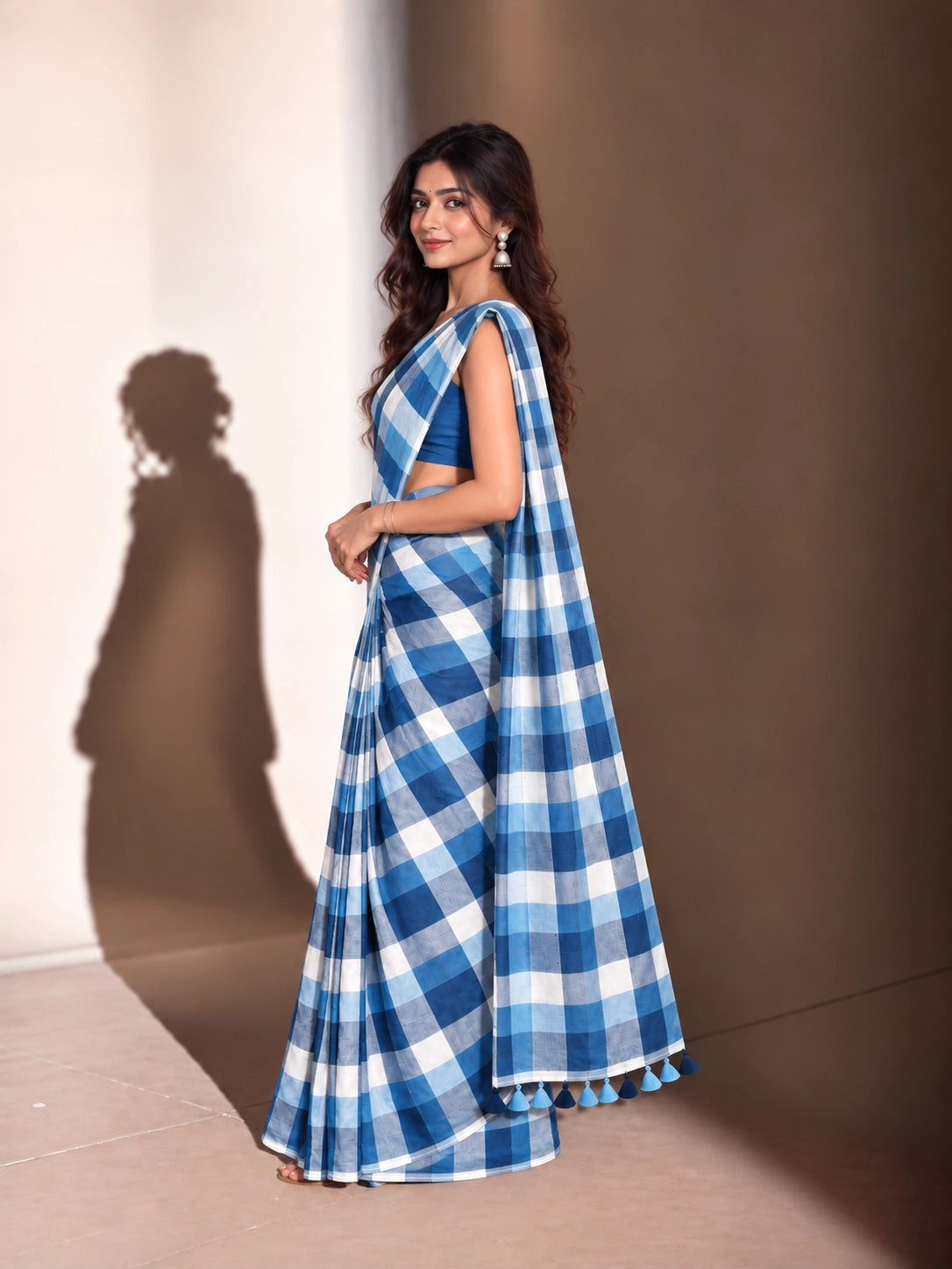 Designer Woven Saree with Checks Pattern & Elegant Tassel Border