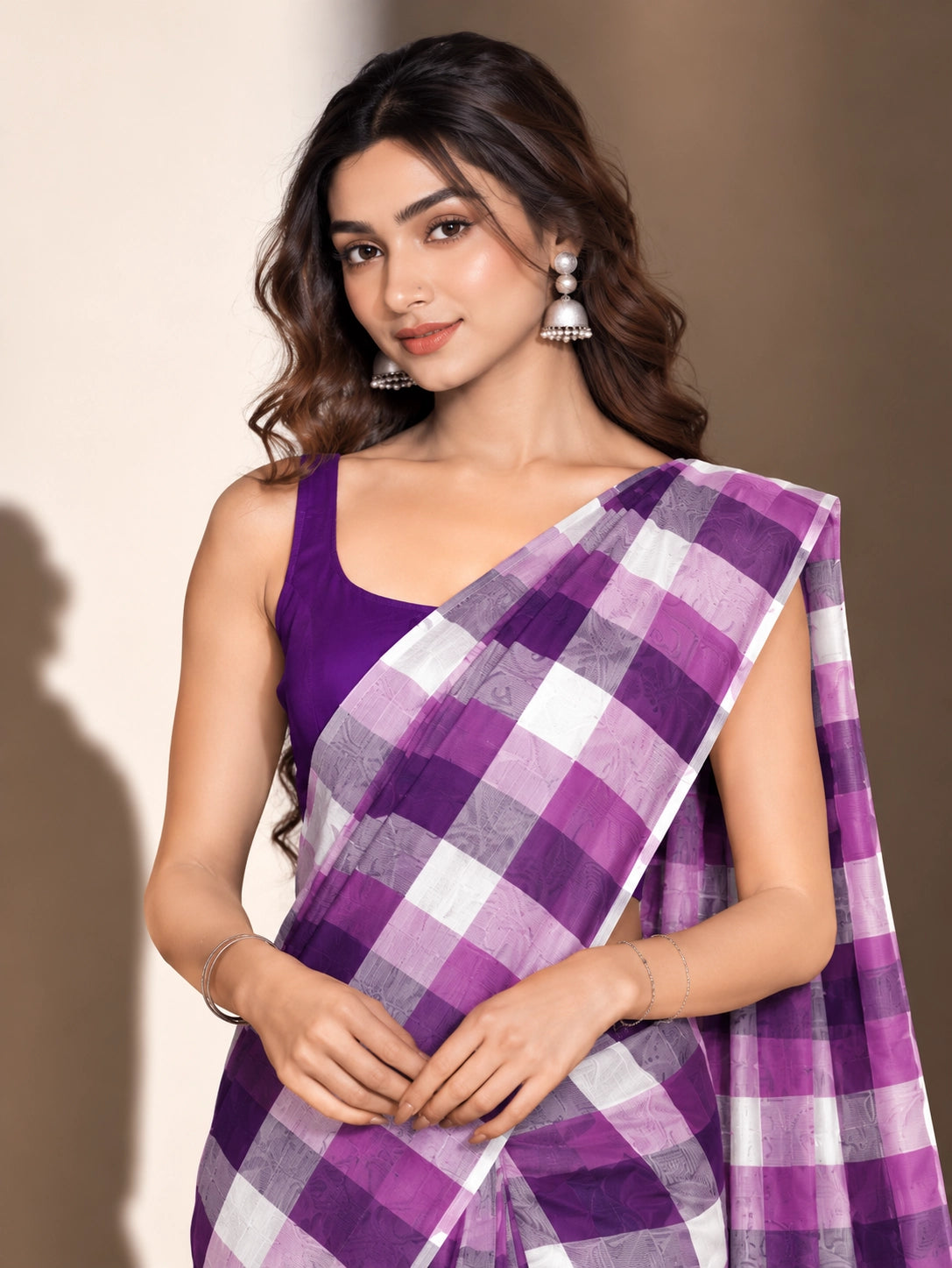 Designer Woven Saree with Checks Pattern & Elegant Tassel Border